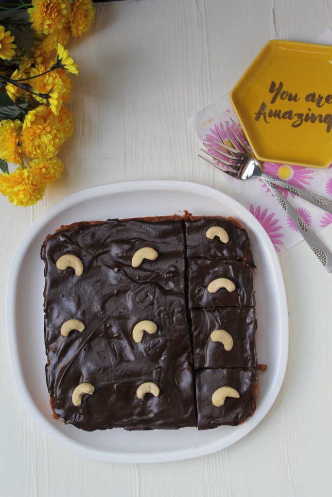 Butterscotch chips and cashew bars with chocolate glaze
