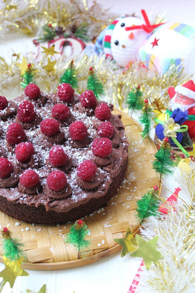 Eggless Dark chocolate cake, chocolate buttercream frosting and fresh raspberries