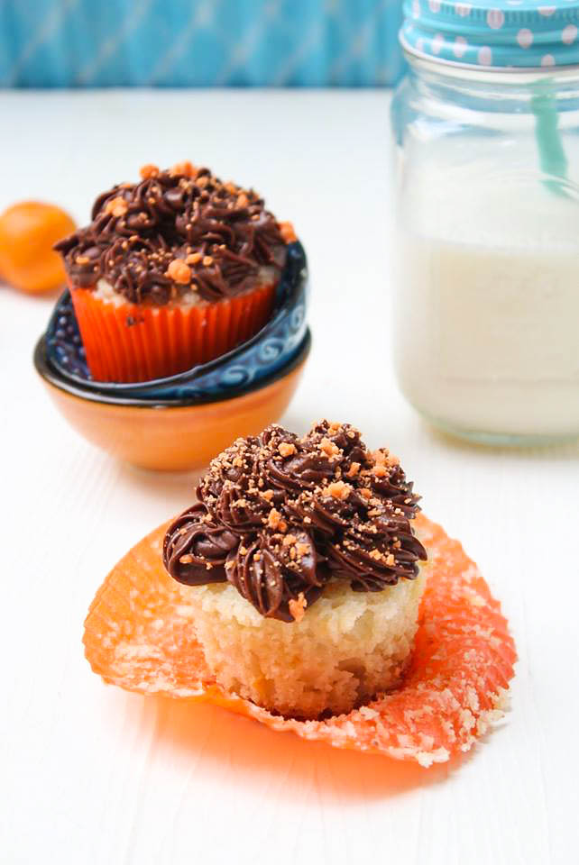 Buttery soft eggless orange cupcake with chocolate buttercream frosting